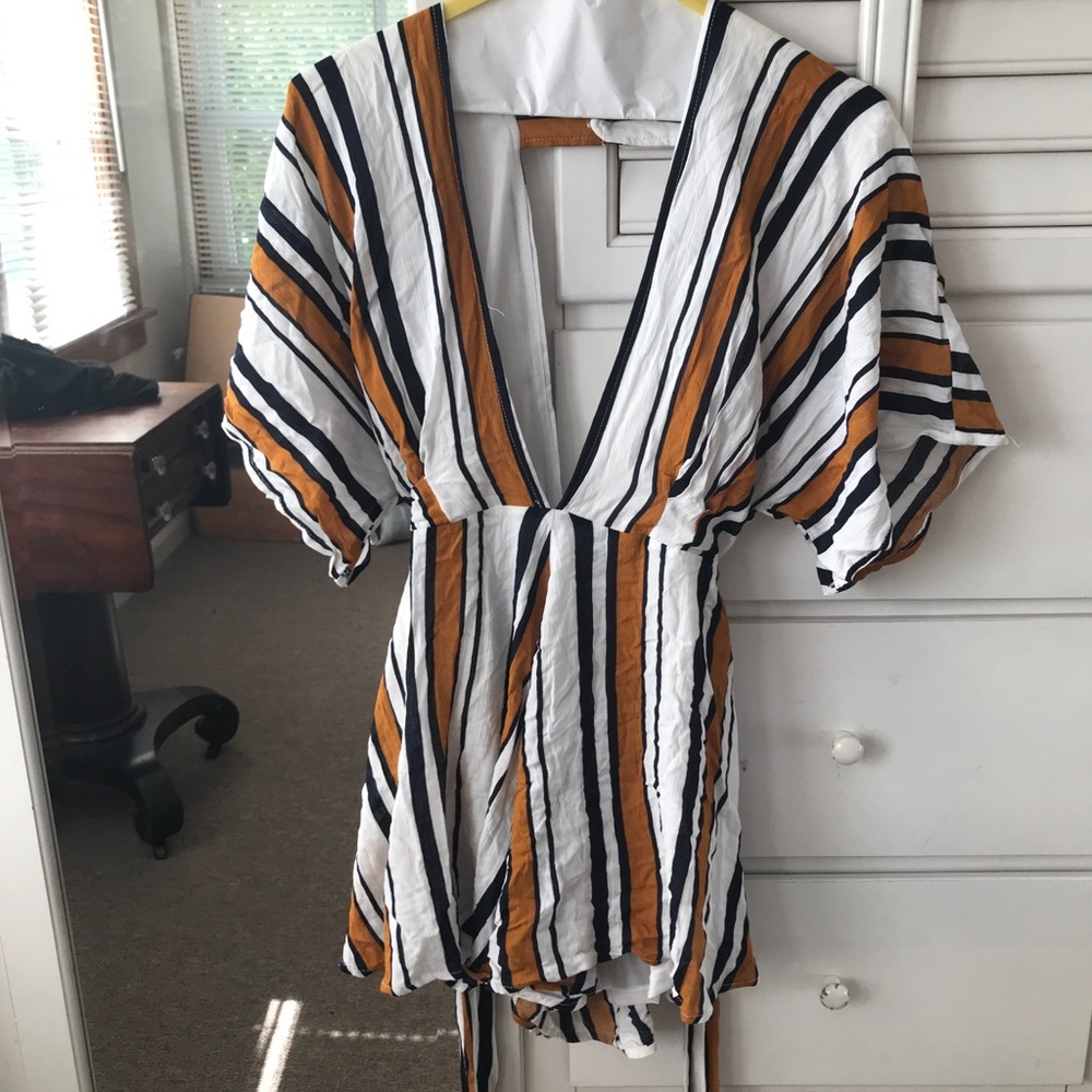 Romper-Akira. Easy to dress up/ beach cover up.